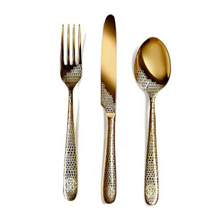 Large serving fork from Roberto Cavalli Home, from the Lizzard (Gold) collection