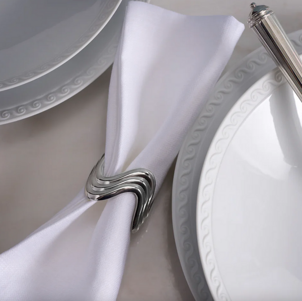 Set of four L'Objet napkin rings, Ripple