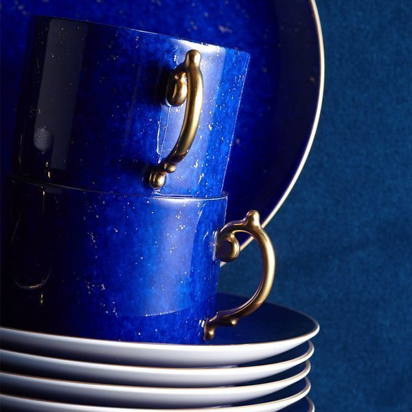 Set of four L'Objet canapé plates, from the Lapis collection