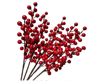 Christmas decoration - a branch with red fruit