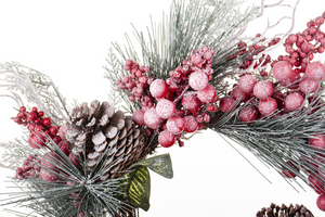 Christmas wreath with rowan and pine cones