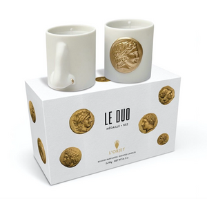 Set of two Medaille Gold candles by L'Objet, from the Grand Bazaar collection