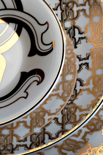 set of six Roberto Cavalli Home bread and butter plates from the Monogram Gold collection,