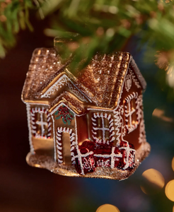 Christmas ornament – a golden house filled with gifts