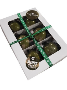 Christmas bauble in mint color with glitter