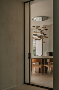 Gold Moon chandelier by Catellani & Smith