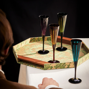 Set of four L'Objet champagne glasses from the Prism collection