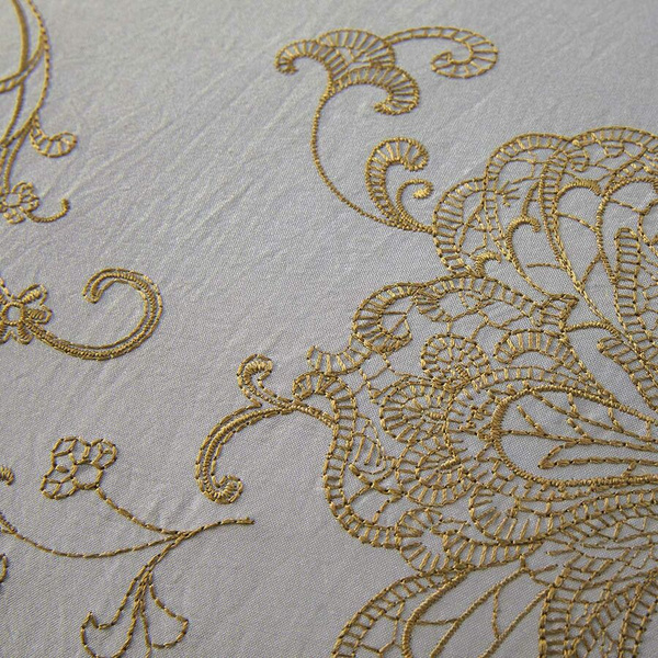 Yves Delorme decorative pillow, from the Soierie collection