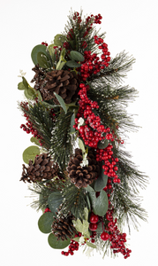 Christmas wreath with hawthorn berries and pine cones