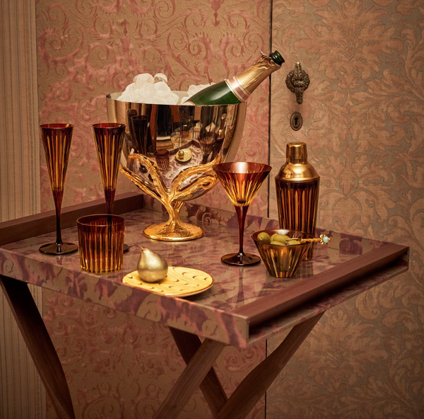 Set of four L'Objet champagne glasses from the Prism collection