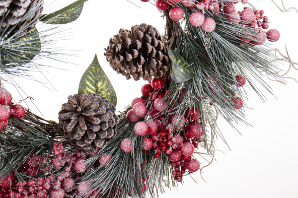 Christmas wreath with rowan and pine cones